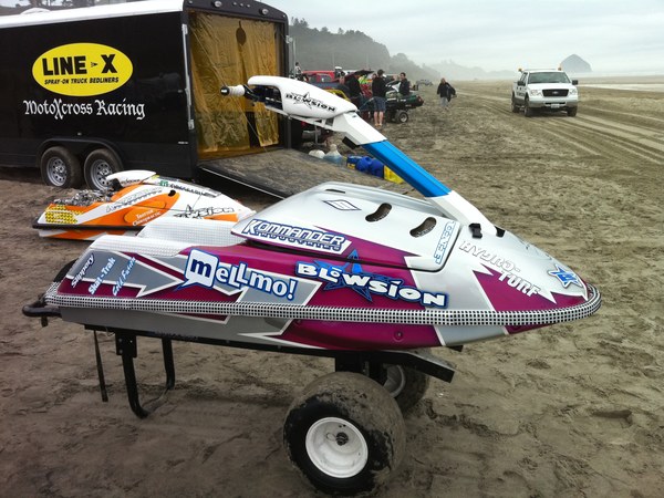 Mellmo-branded jetski on the beach